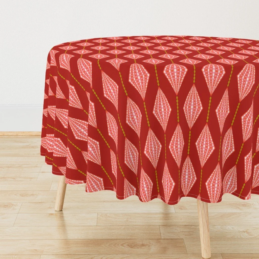 Jolly & Bright: Hanging Ornament Diamond Stripe in Red and Pink on a tablecloth by Spoonflower, copyright Sandra Hutter.