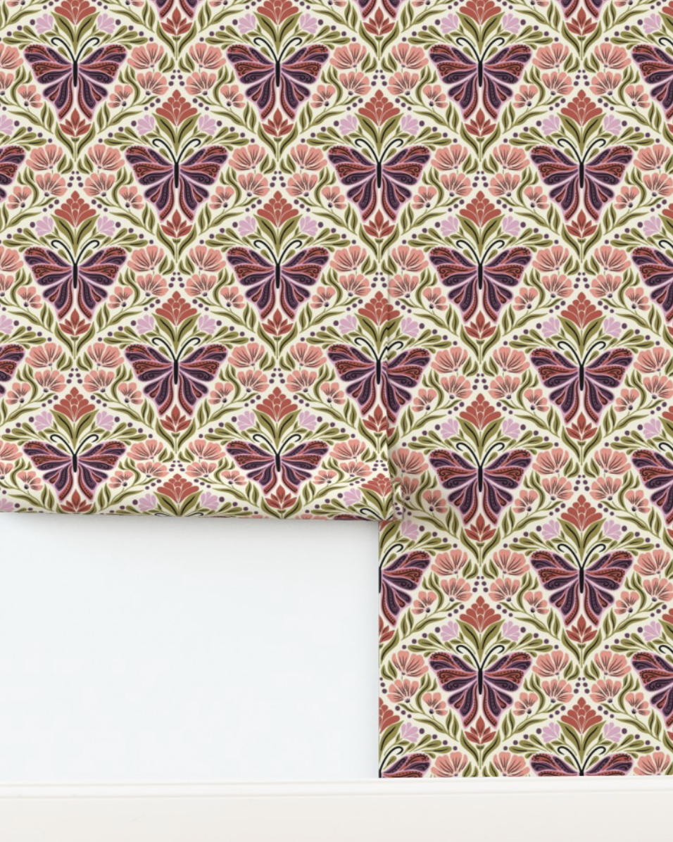 Wallpaper with plum butterflies and coral folk flowers in a mirrored damask on cream, copyright Sandra Hutter.