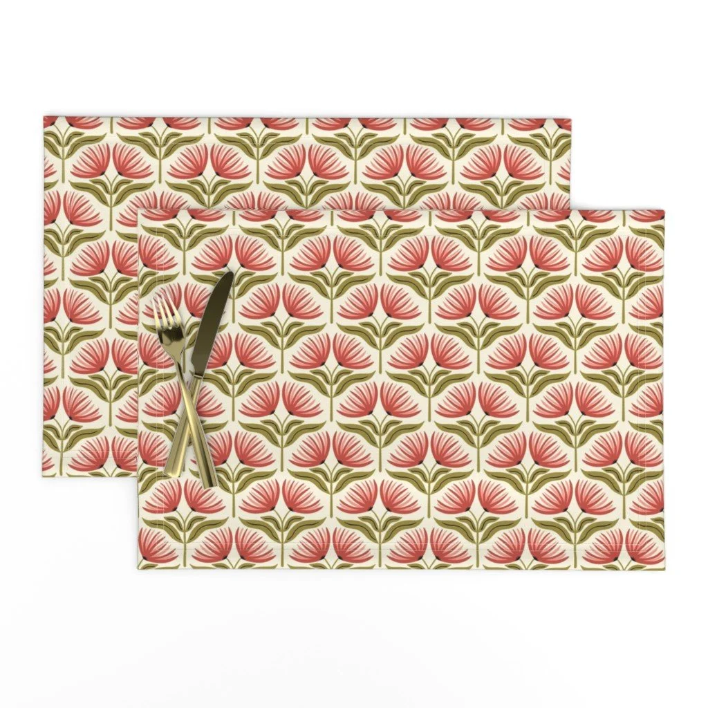 Placemats with red clay folk fan flowers on olive stems on cream, copyright Sandra Hutter.