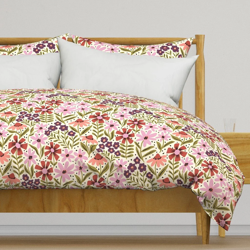 Duvet cover (bedroom) with a ditsy wildflower meadow in terra cotta, plum and blush on cream, copyright Sandra Hutter.