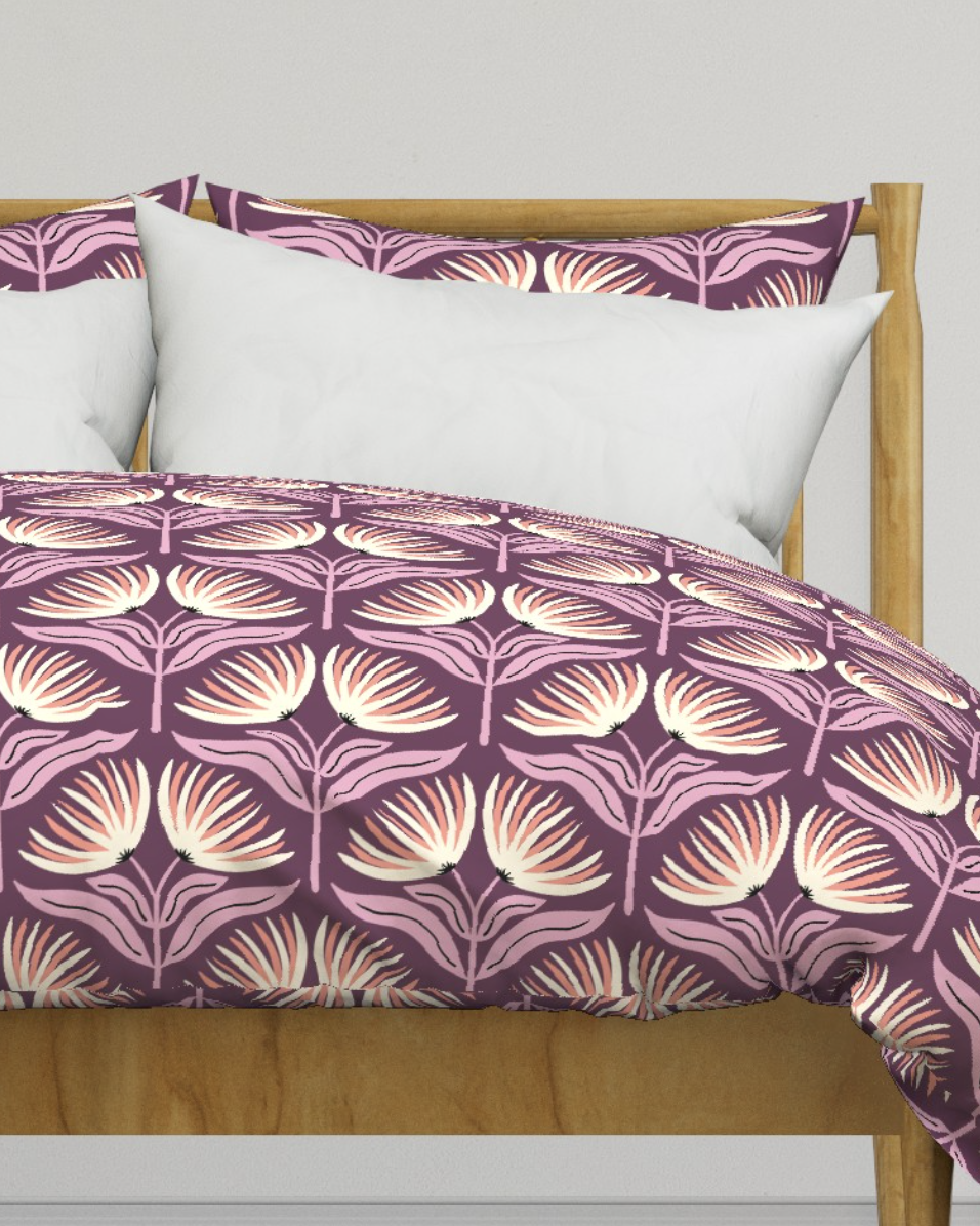 Duvet cover with cream and coral fan flowers on a deep plum ground, copyright Sandra Hutter.