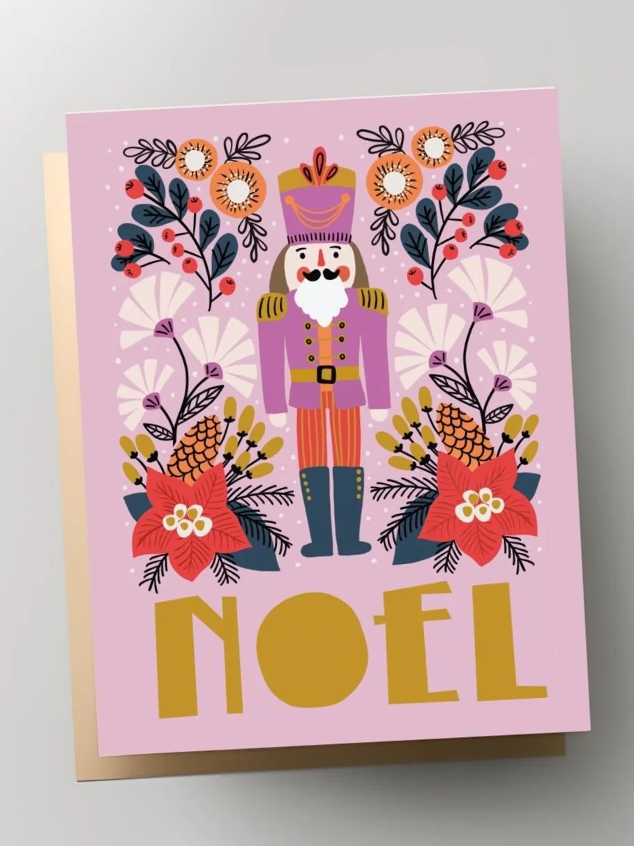 noel christmas greeting card with nutcracker in purple pink colors