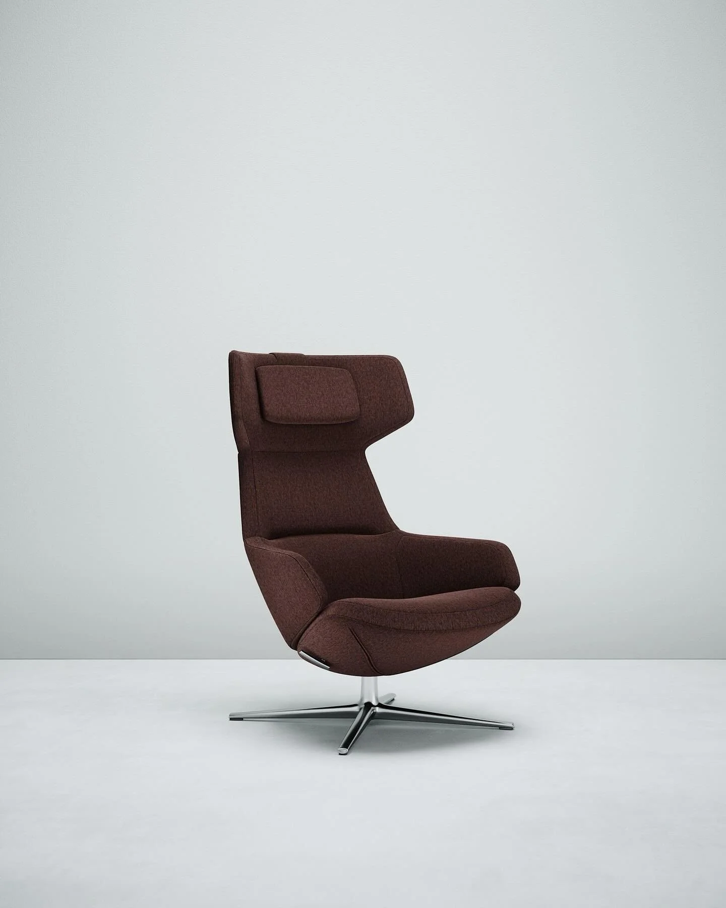 TelaMia is a modern melange upholstery textile crafted from 100% recycled polyester, channelling Giulio Ridolfo&rsquo;s celebrated colours into our collection of recycled polyester upholsteries, shown here on Jean-Marie Massaud&rsquo;s Aston Club lou