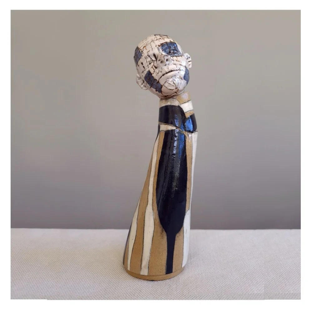 Large head stoppered ceramic vessel