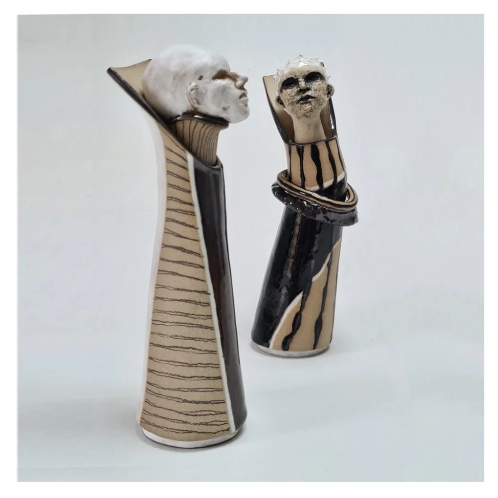 Sculpted male and female vases Harriet Ferris