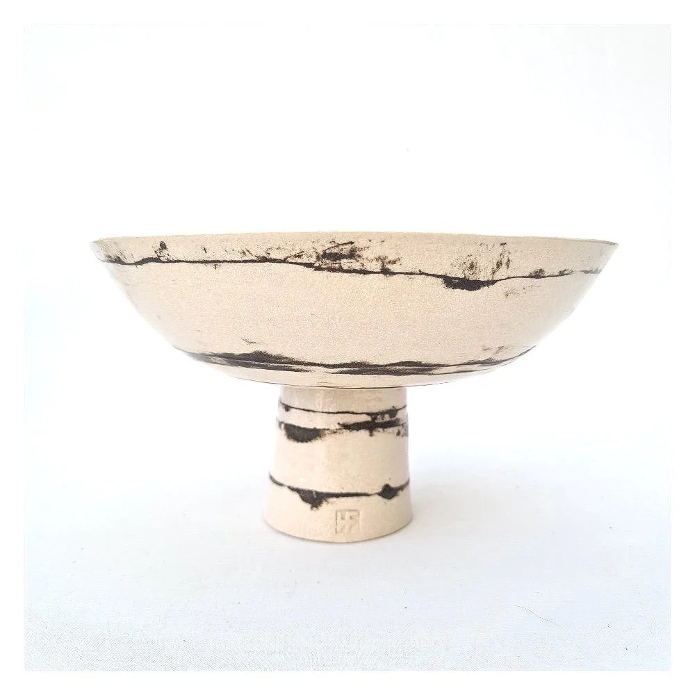 Large black and white pedestal bowl