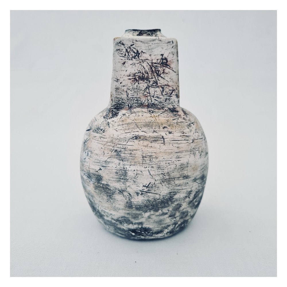 Ceramic vase in black and white slips and glazes