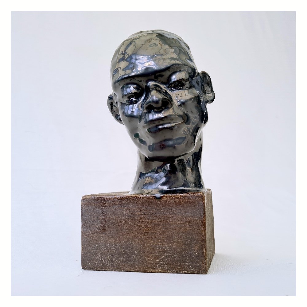 Strongly Gentle, sculpture of a head by Harriet Ferris .jpg