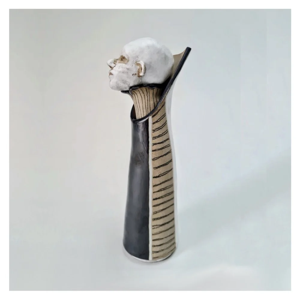 Vase with sculpted head stopper LHS