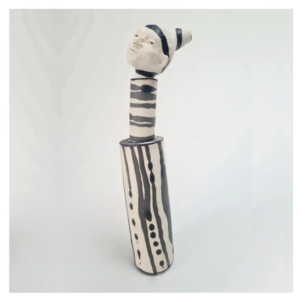 Ceramic bottle head sculpture black and white