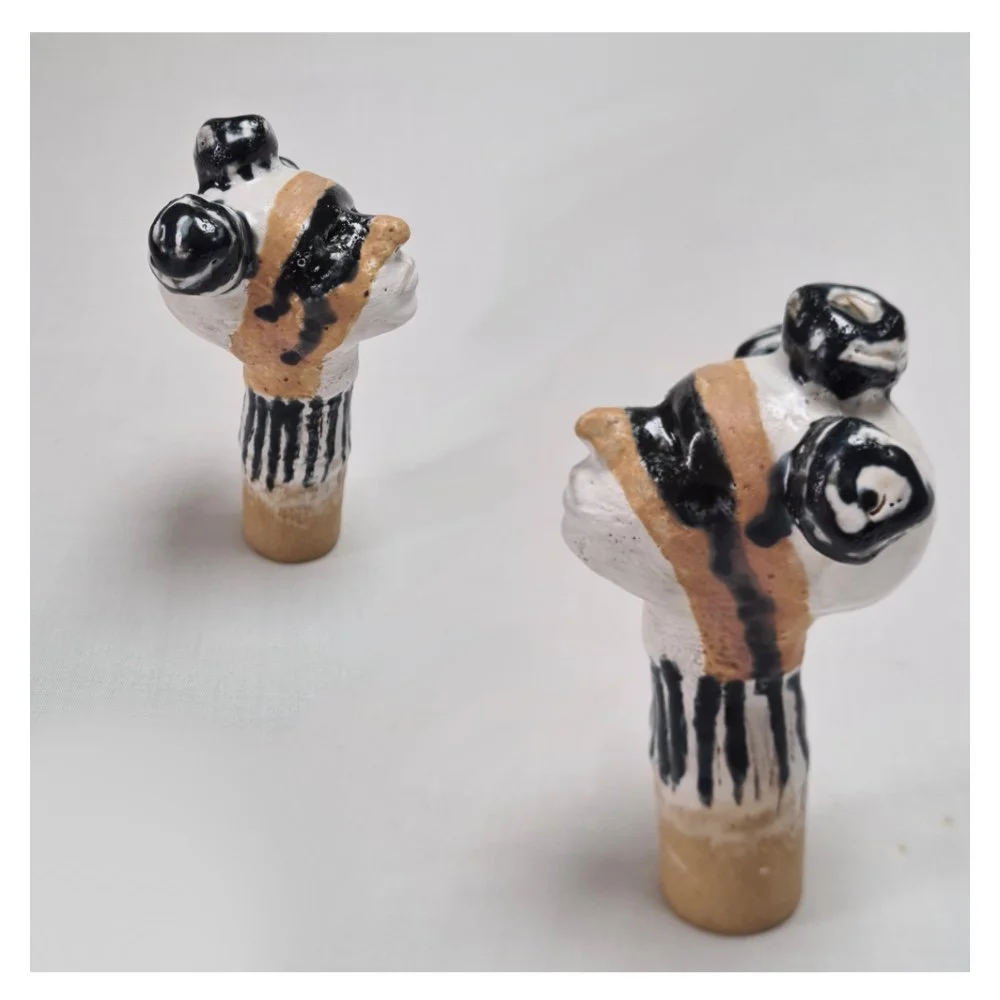 Ceramic sculpture detail of removable head .jpg