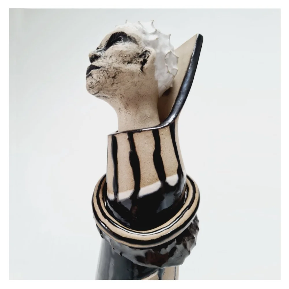 Sculpted female vase (LHS) Harriet Ferris