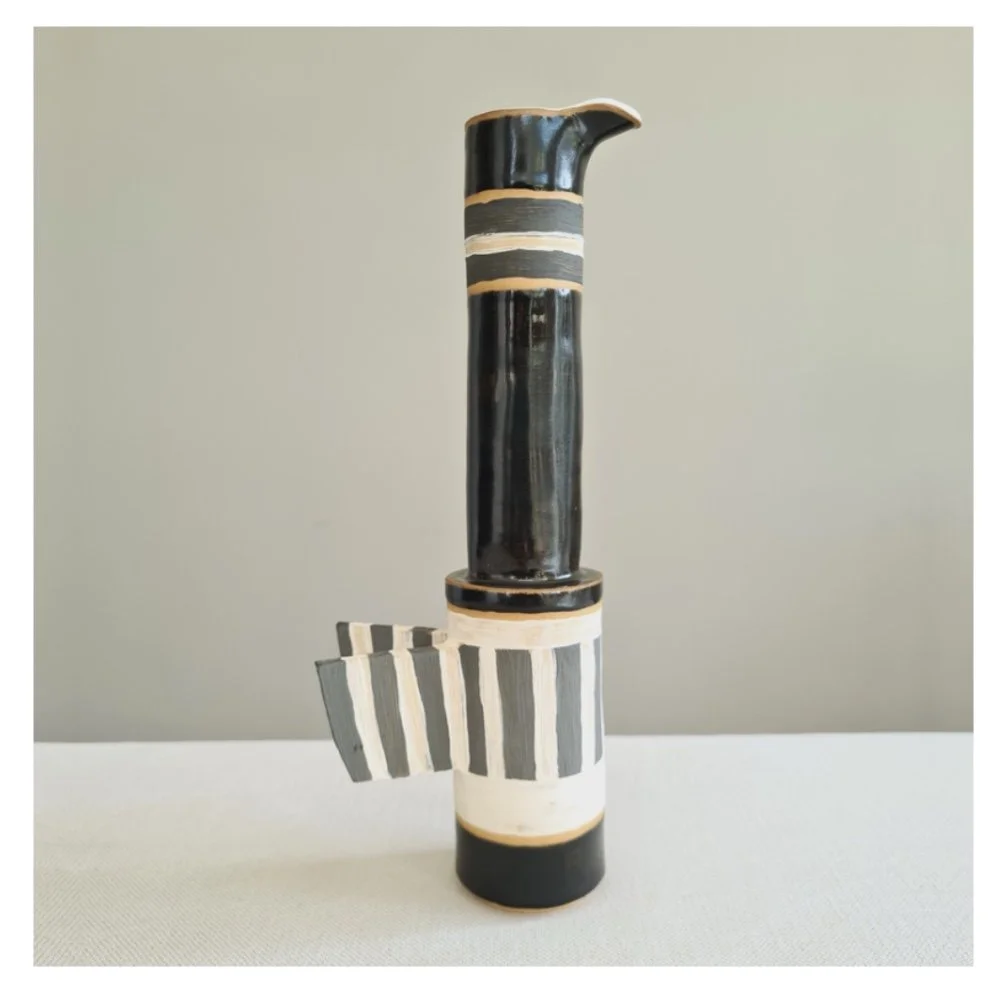 Harriet Ferris long necked black winged ceramic jug