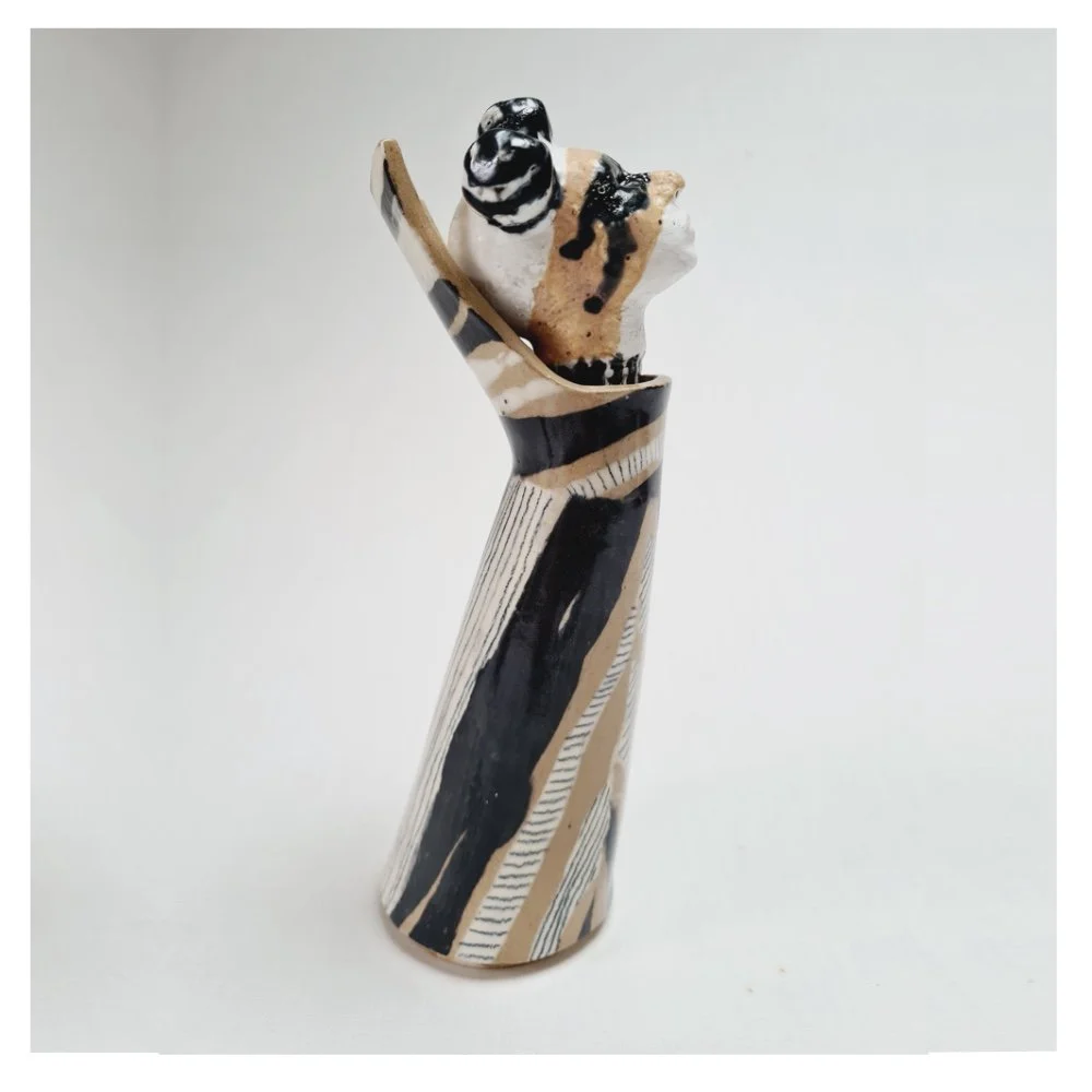Ceramic sculpture with removable head rhs.jpg