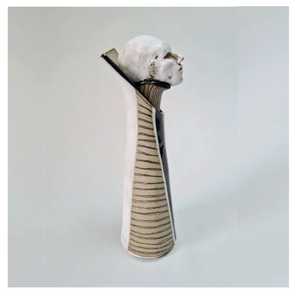 Vase with sculpted head stopper RHS