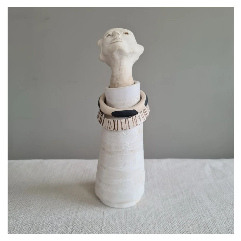 Head in the clouds ceramic sculpture front