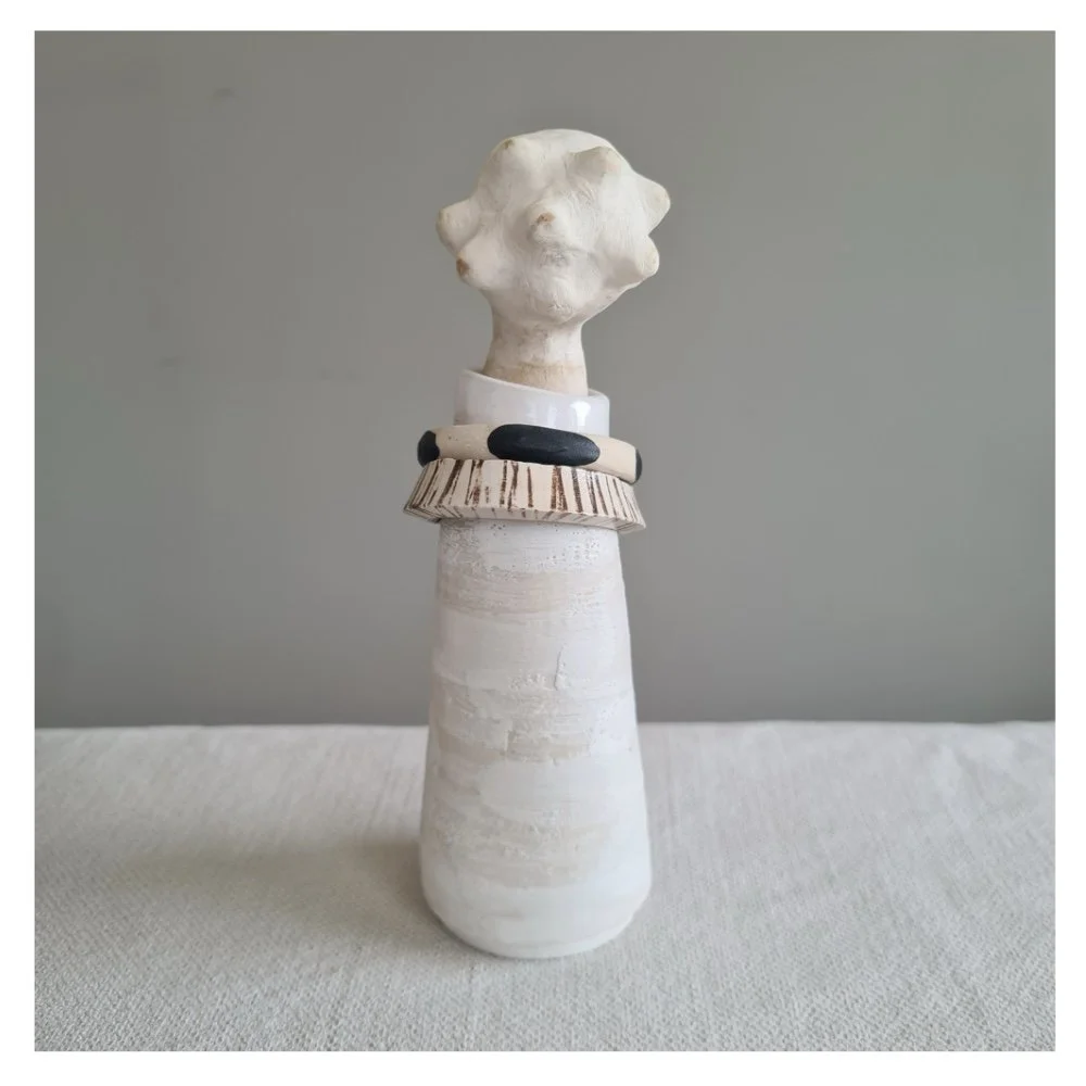Head in the clouds ceramic sculpture back