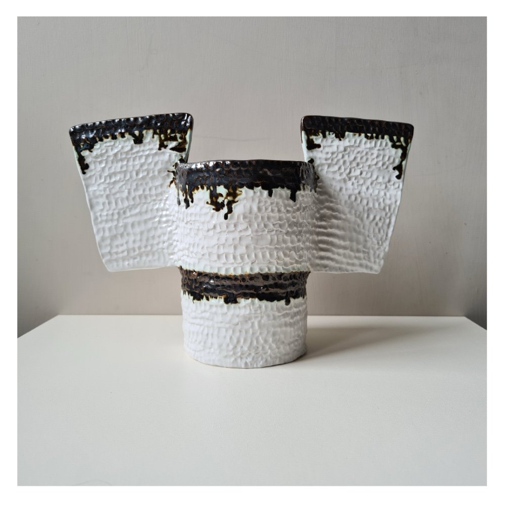 Vase in metallic black and white by Harriet Ferris