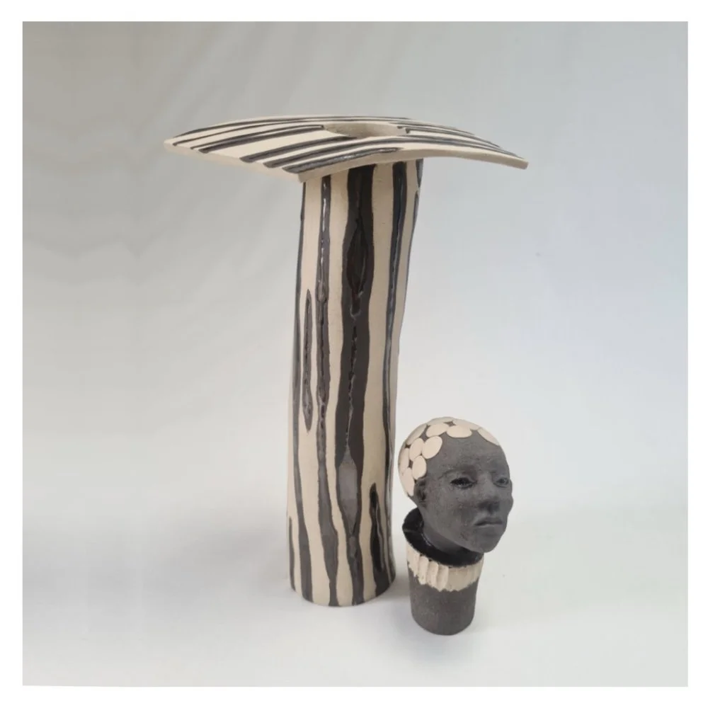 Ceramic head sculpture stopper