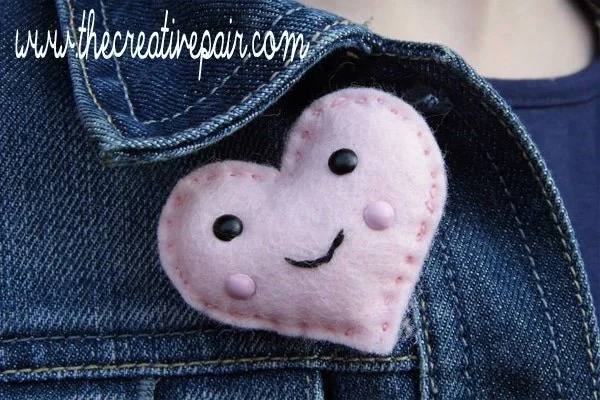 Kawaii felt heart brooch on a denim jacket