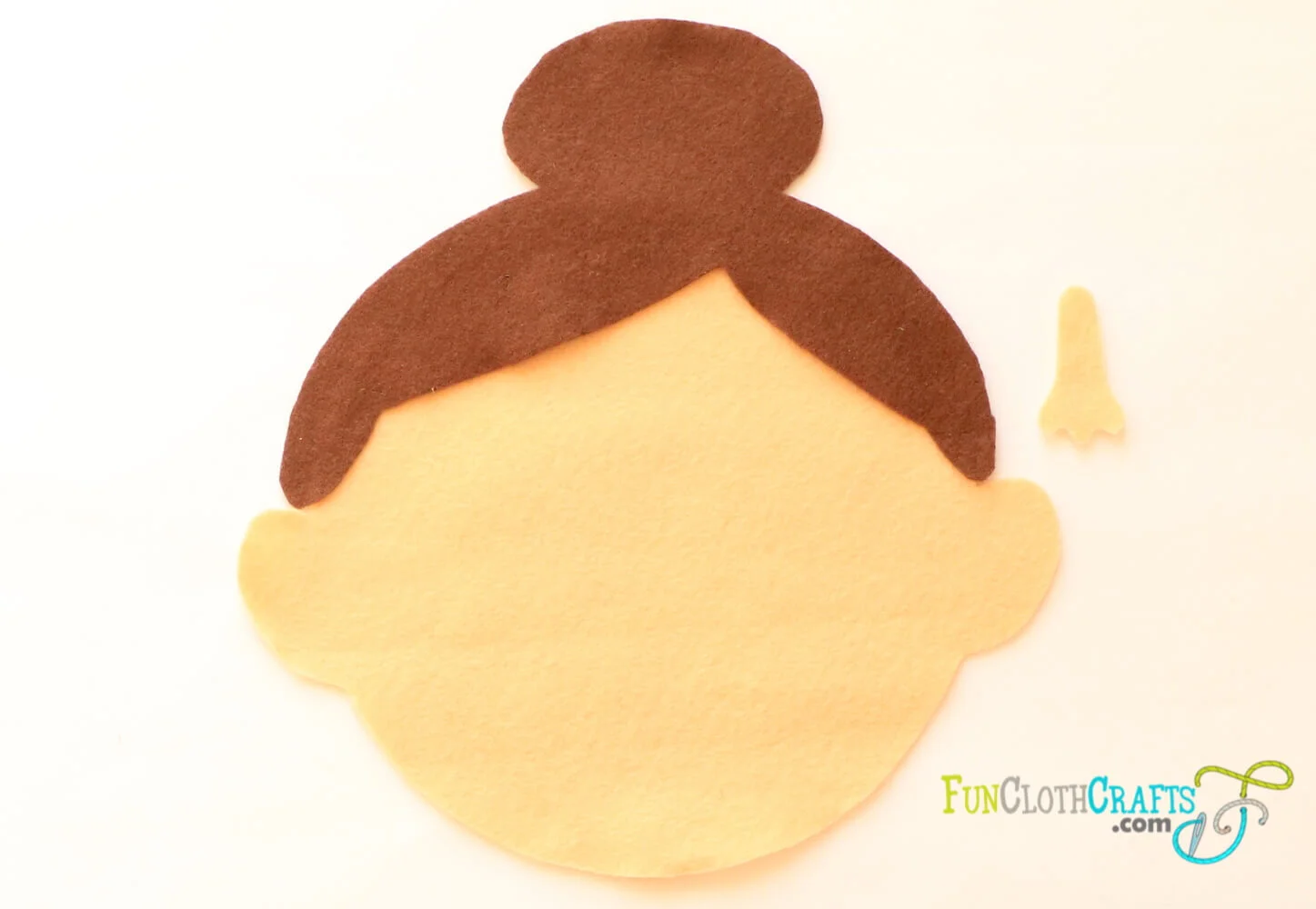 Glued Hair to Felt Face and Nose prepared to be glued