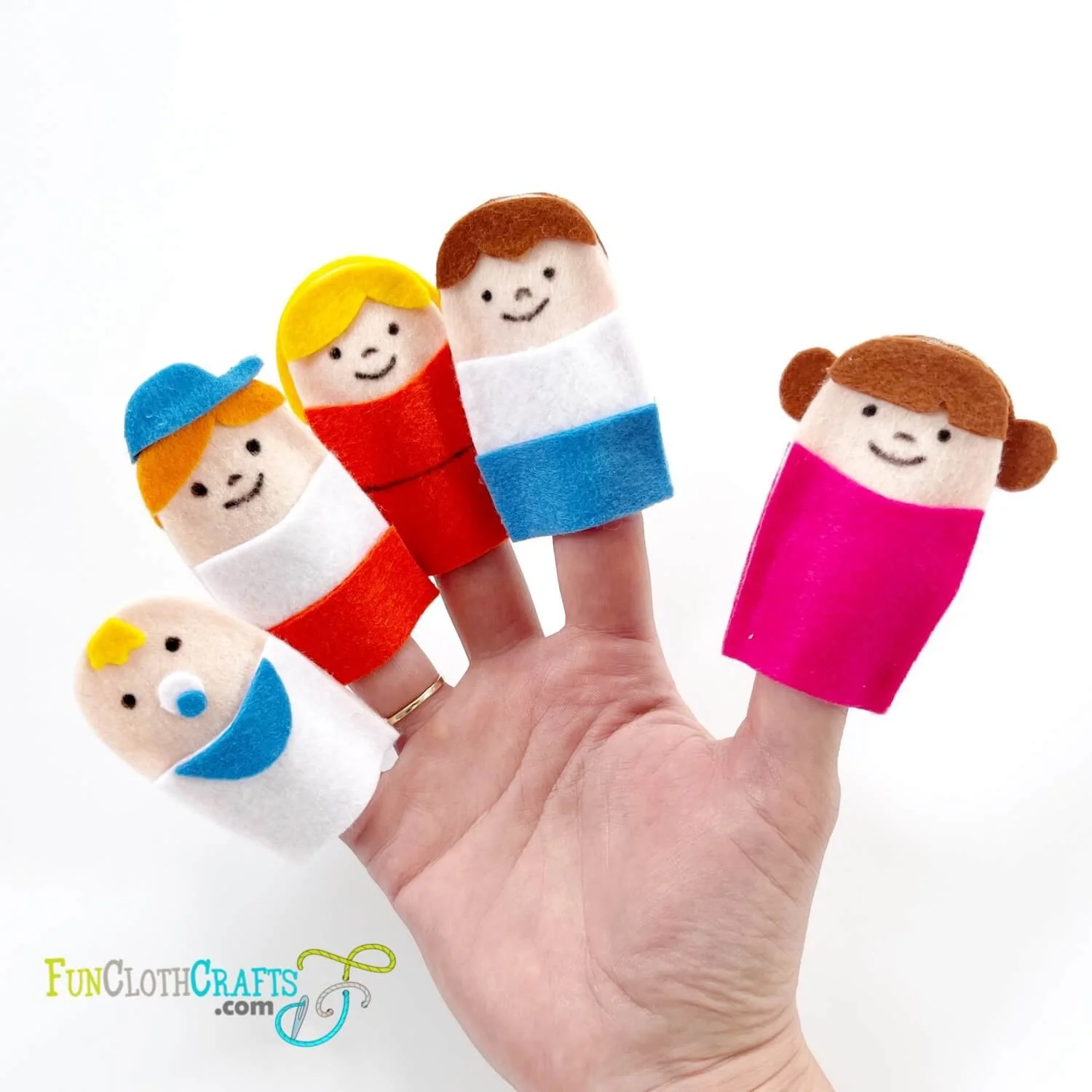 Any mini project from felt?

I was looking for some easy quick pattern in my freebies and found one: https://www.funclothcrafts.com/all-posts/free-no-sew-family-finger-puppets
This pattern is no-sew, no embroidery. 

Would you share yours?

 #freepat