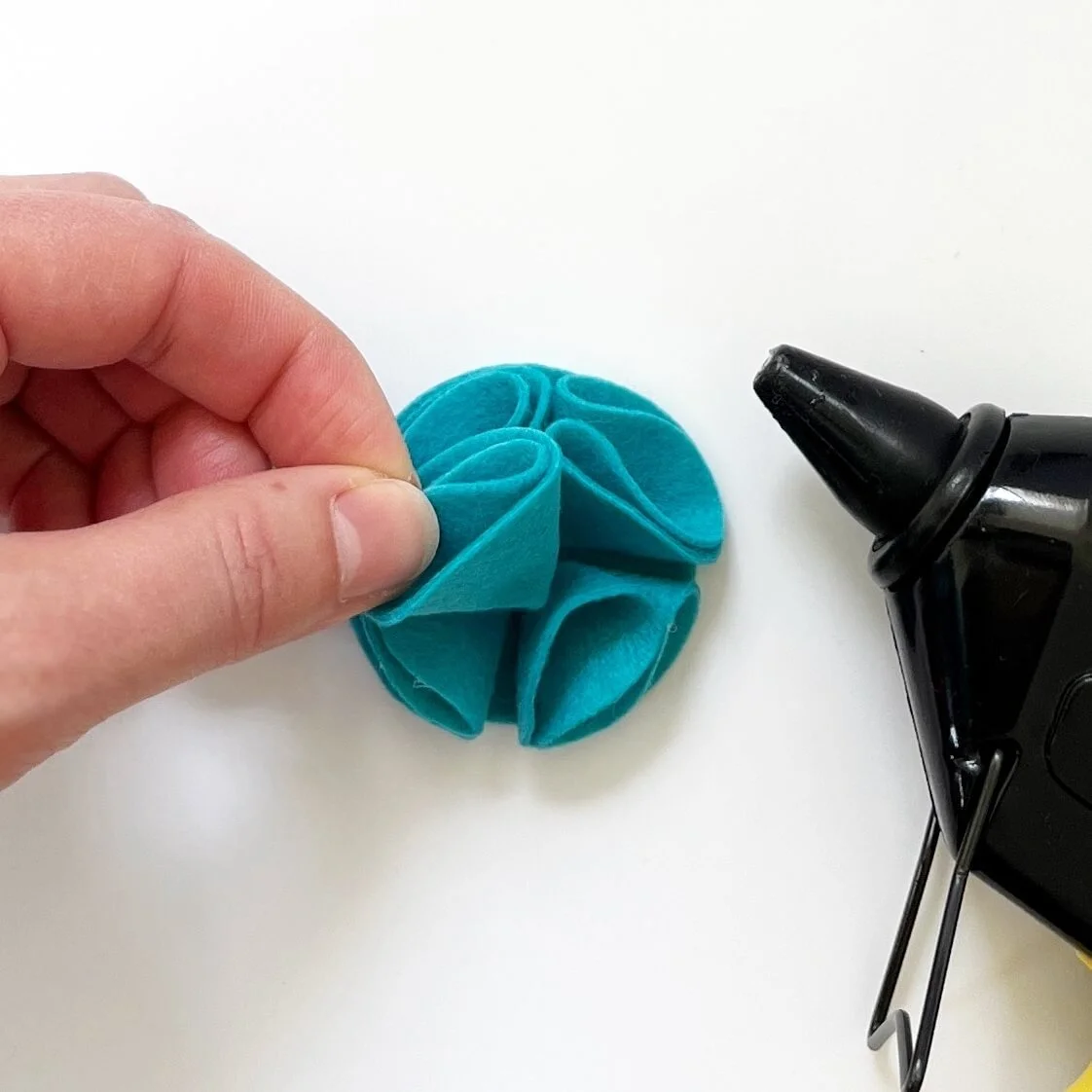 fifth folded flower piece added to the folded flower