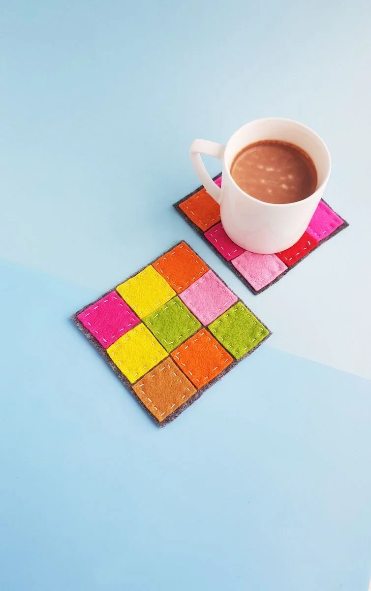 patchwork felt coasters to make, colorful felt coasters and coffee standing on the coaster