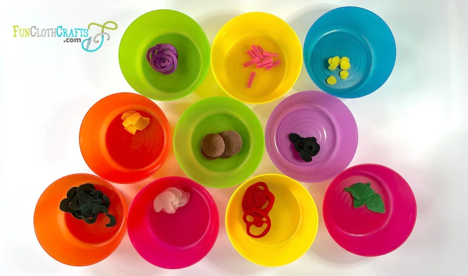 Toppings in bowls for felt pizza