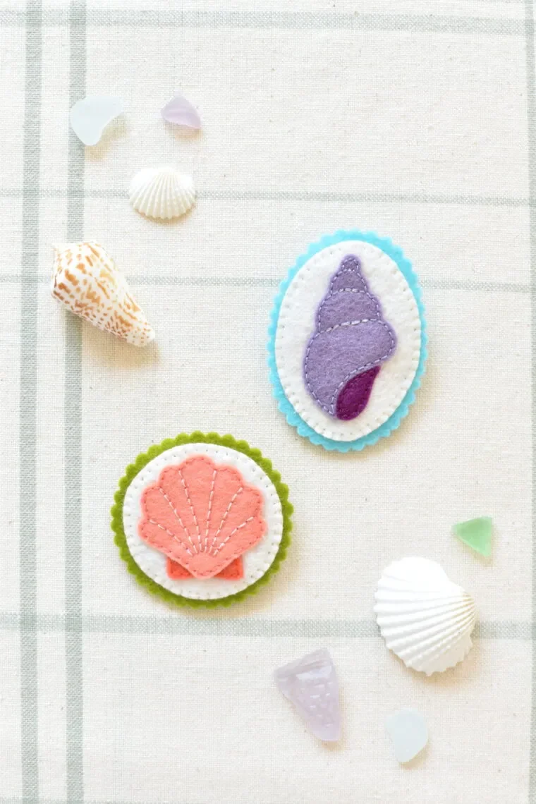two seashell brooches from felt scraps