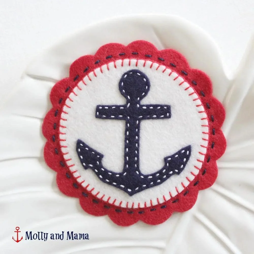 nautical anchor felt coaster with red background and blue anchor