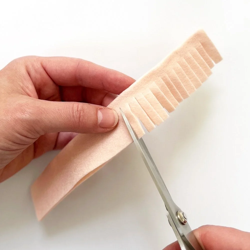 felt stripe cut to 3/4 to make rolled felt flower