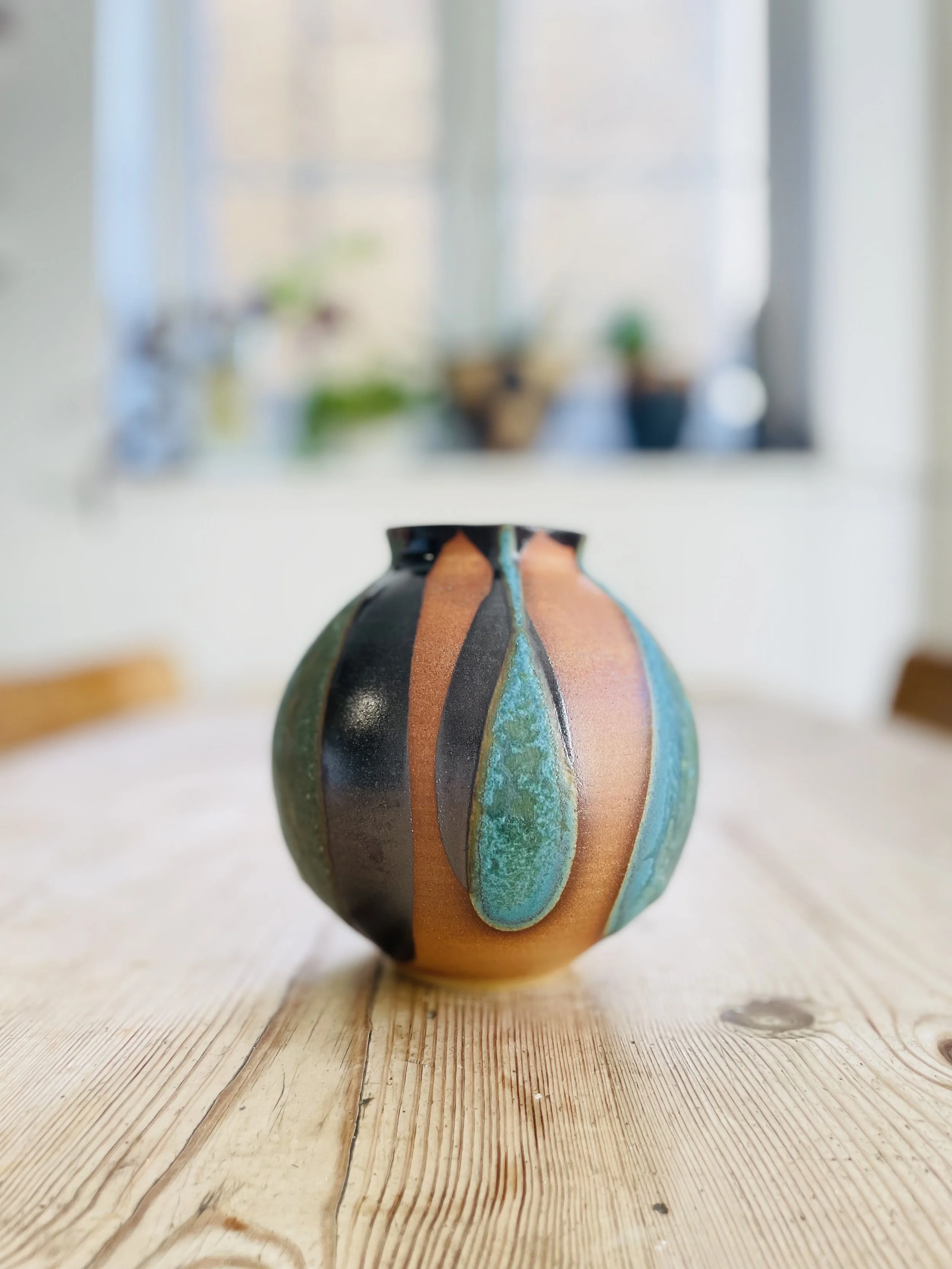 Stoneware hand thrown moon jar vase glazed in tenmoku and turquoise 5