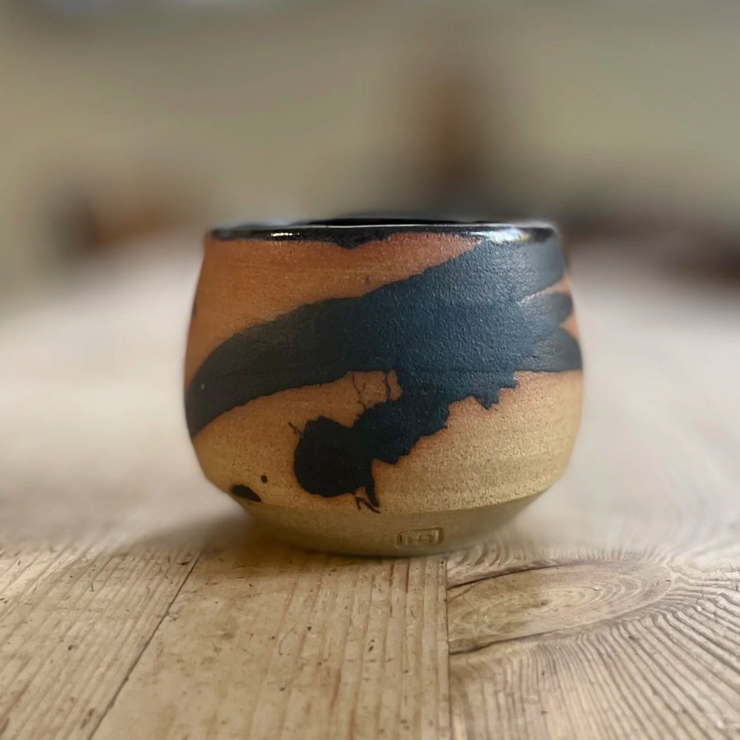 Stoneware hand thrown cup glazed in bamboo mark making 1