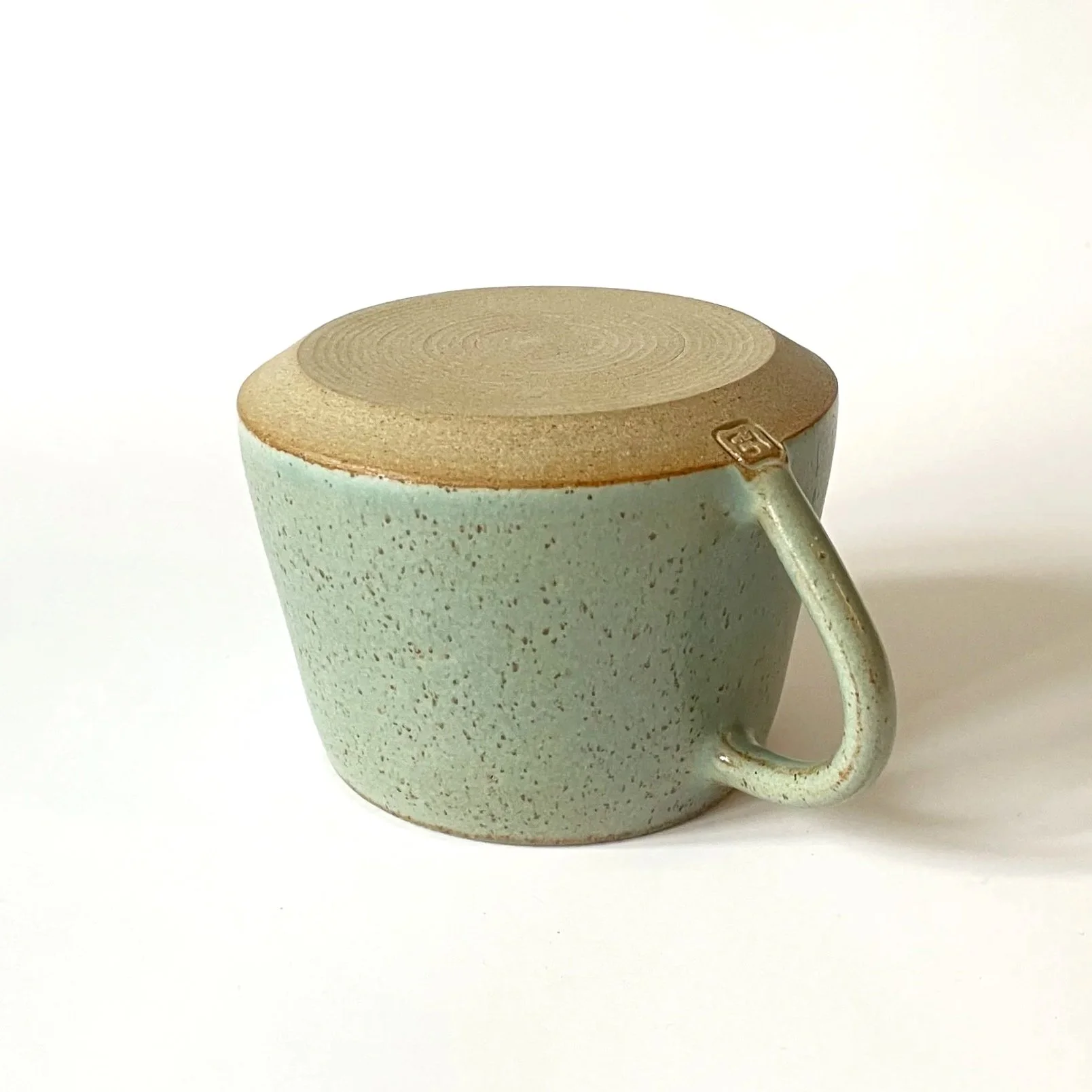 Hand thrown stoneware cup glazed in celadon 3