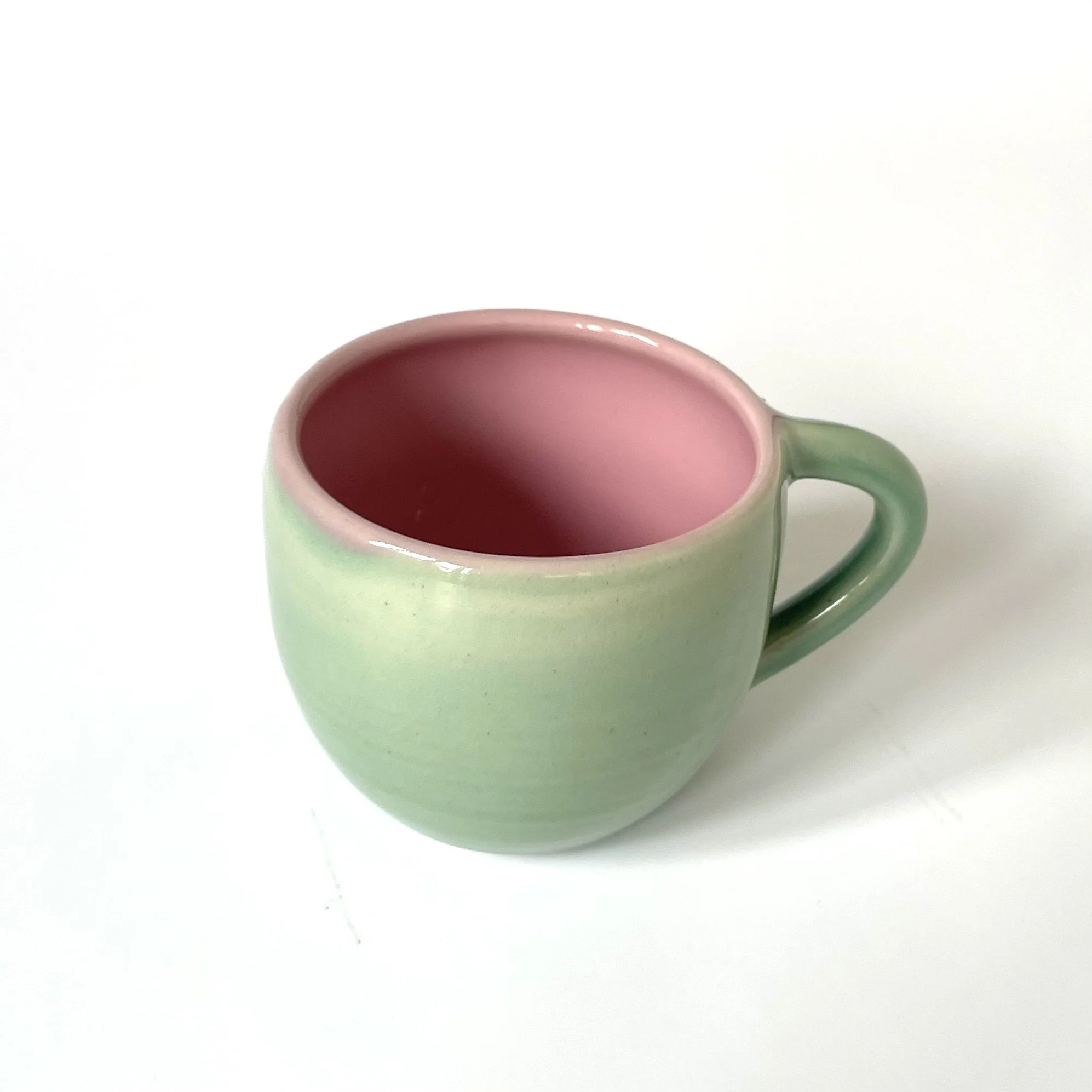 pink and green curved hand thrown stoneware flat white cup 4