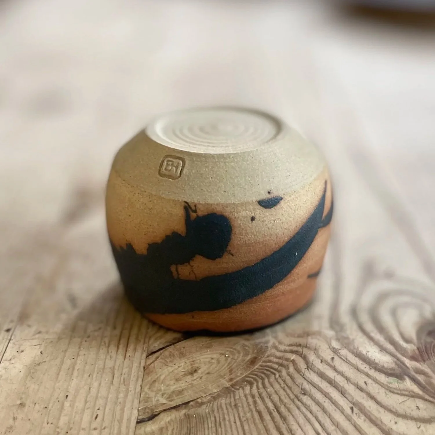 Stoneware hand thrown cup glazed in bamboo mark making 3