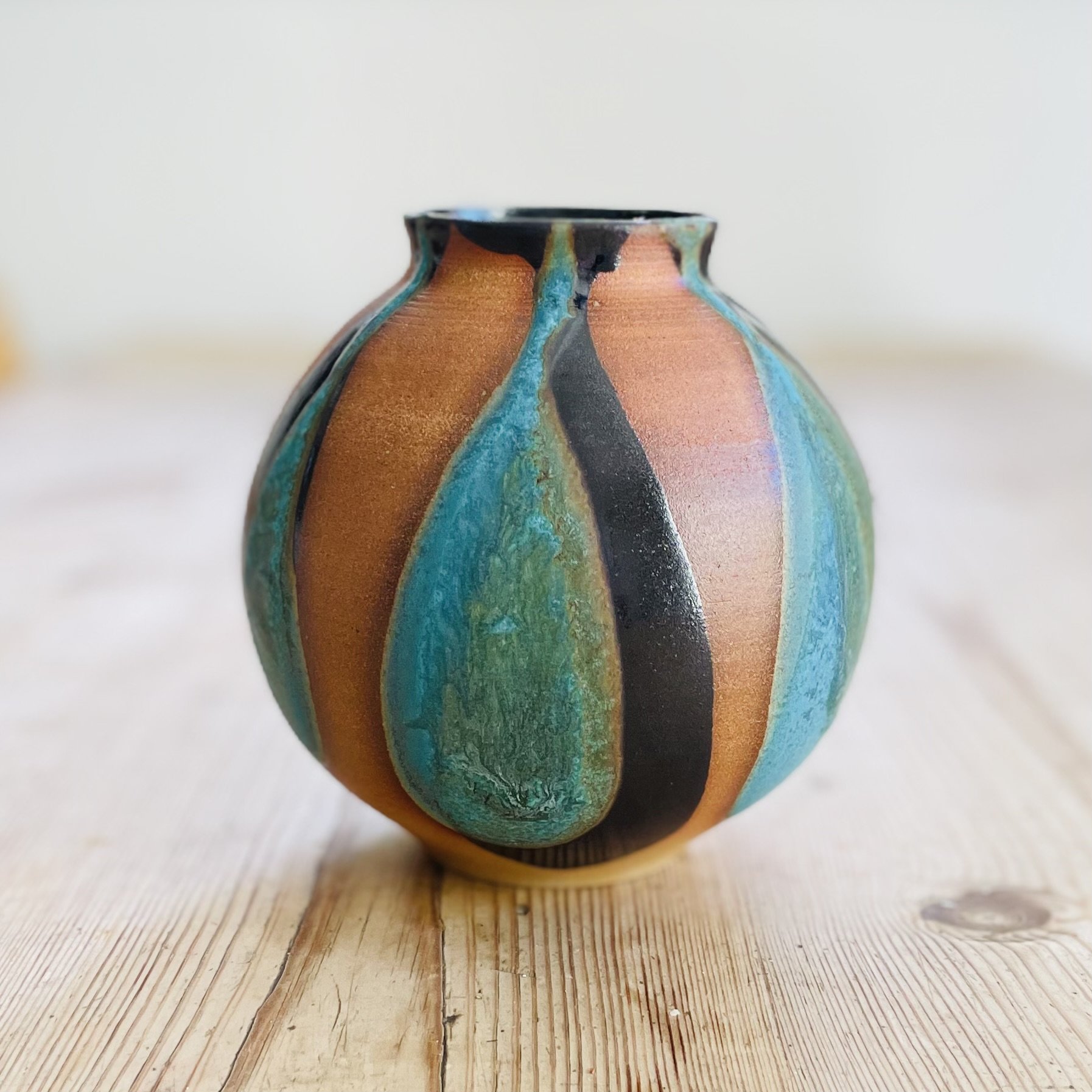 Stoneware hand thrown moon jar vase glazed in tenmoku and turquoise 2