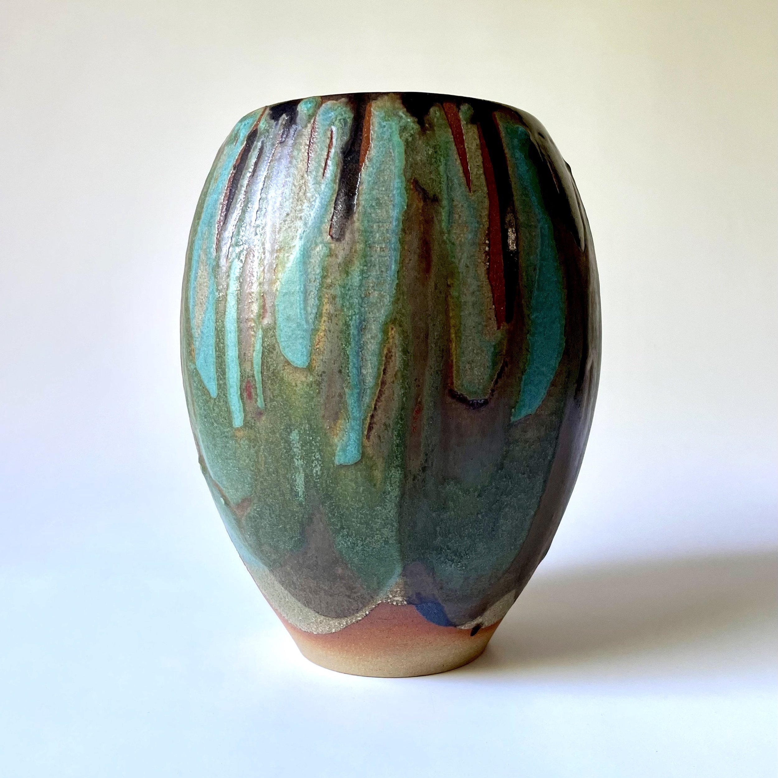 curved stoneware vase glazed in tenmoku and turquoise hand thrown 3