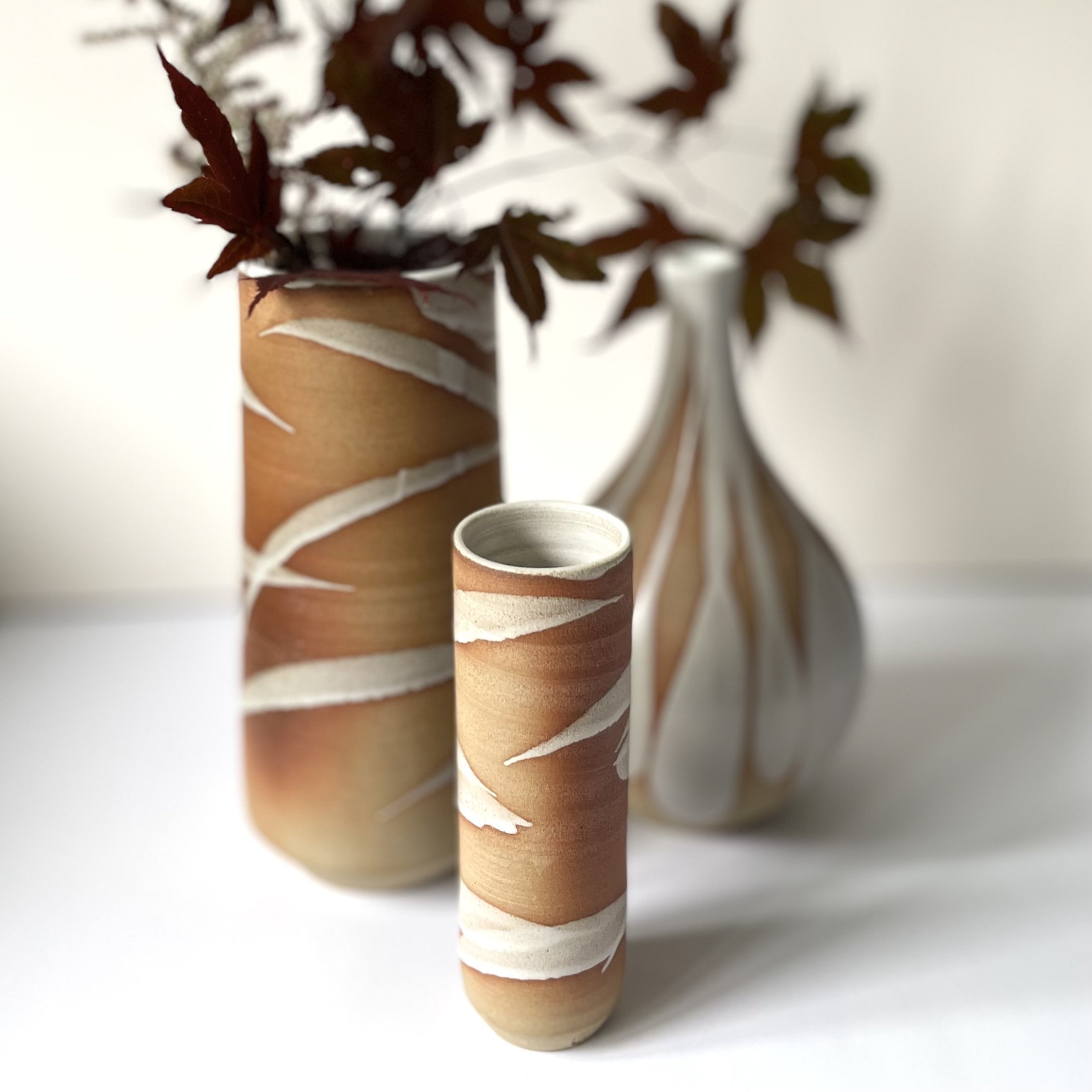 Small stoneeware vase glazed in white bamboo mark making 5