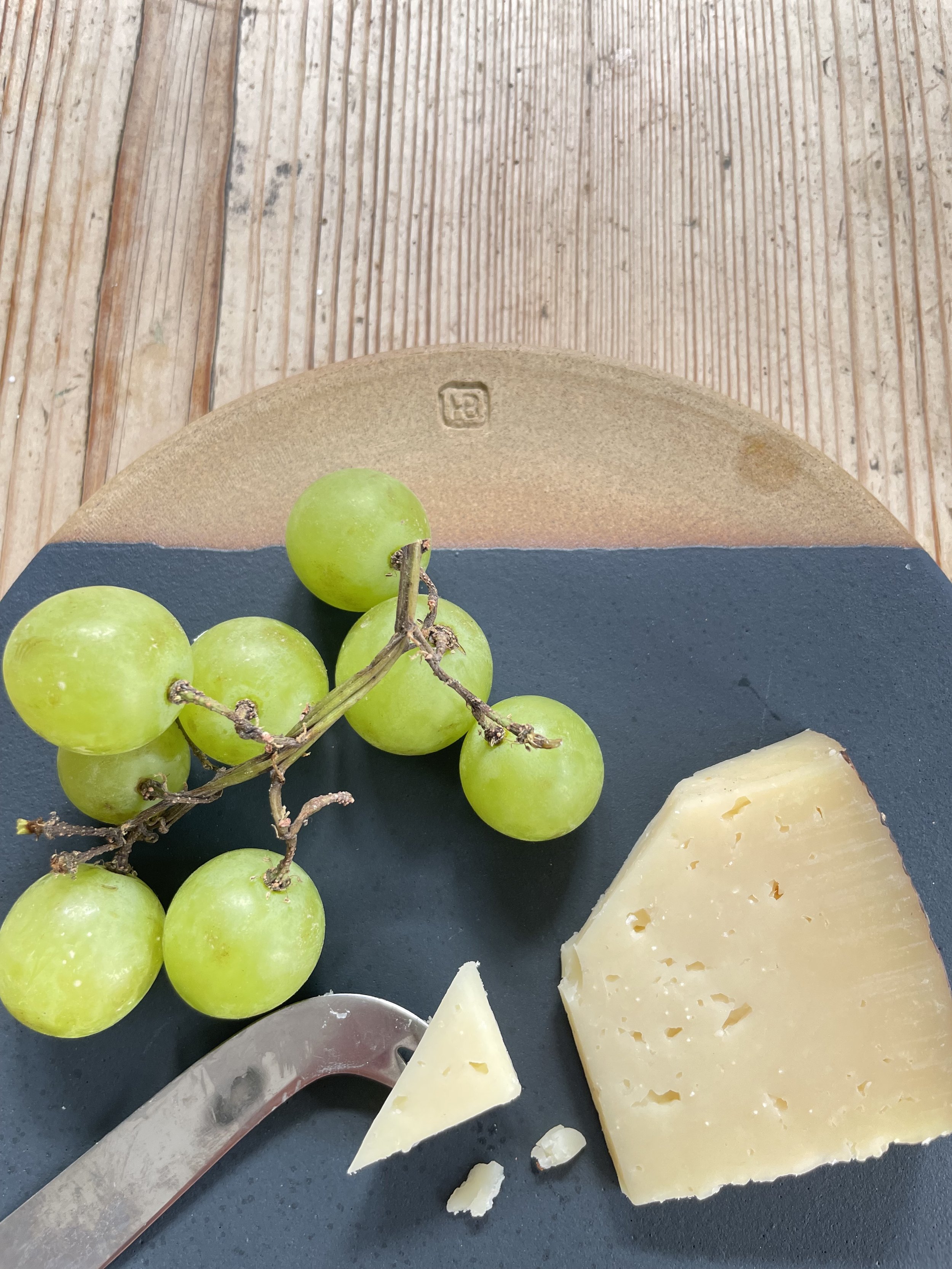 Small stoneware cheese plate glazed in charcoal 3