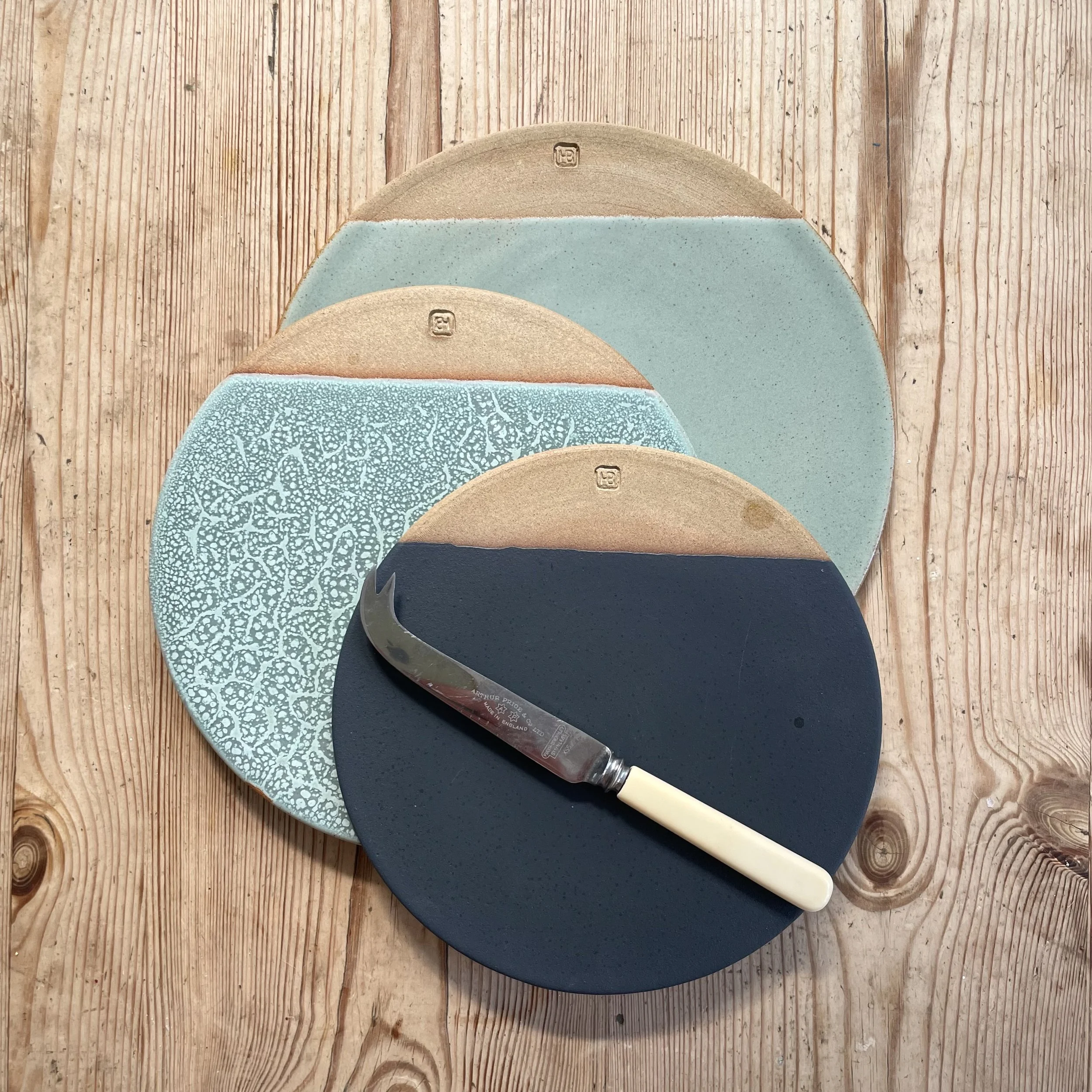 Small stoneware cheese plate glazed in charcoal 2