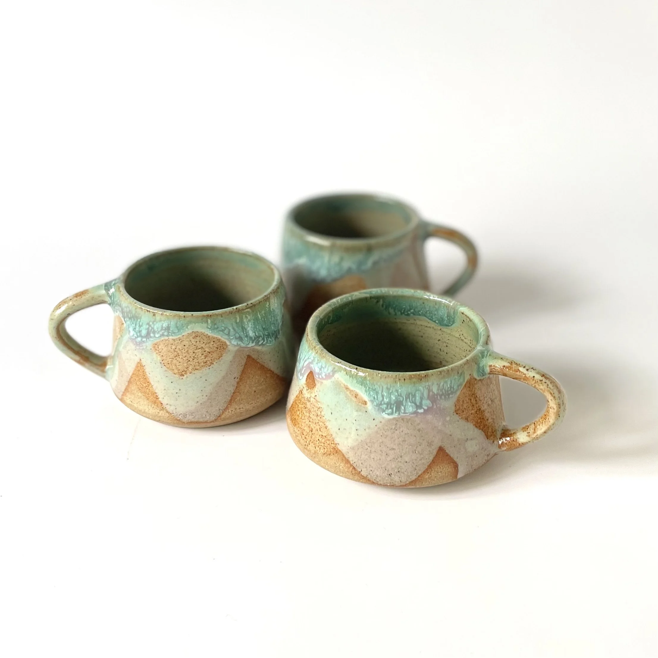 Small stoneware espresso cup in celadon and pink 4