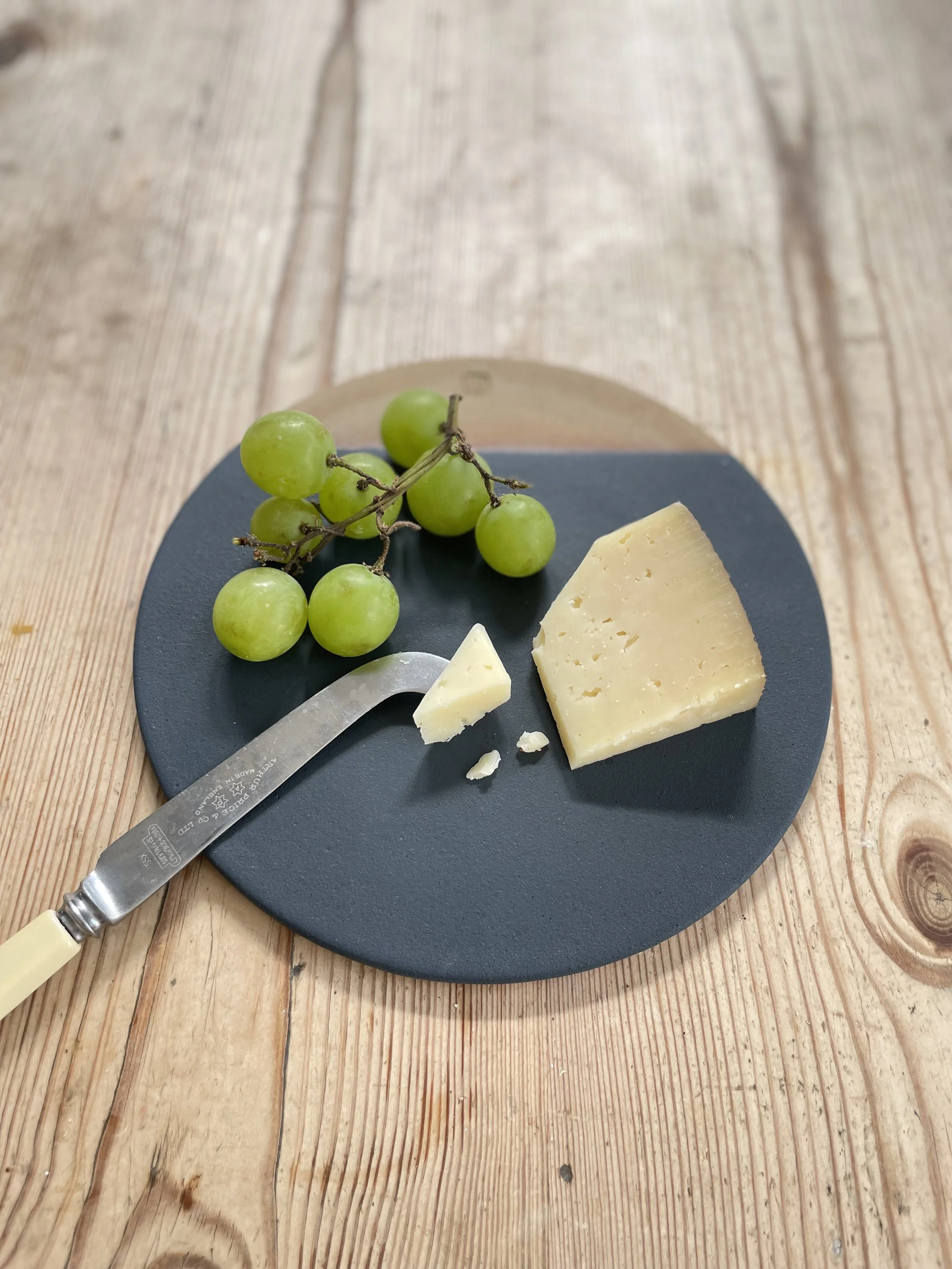 Small stoneware cheese plate glazed in charcoal 1