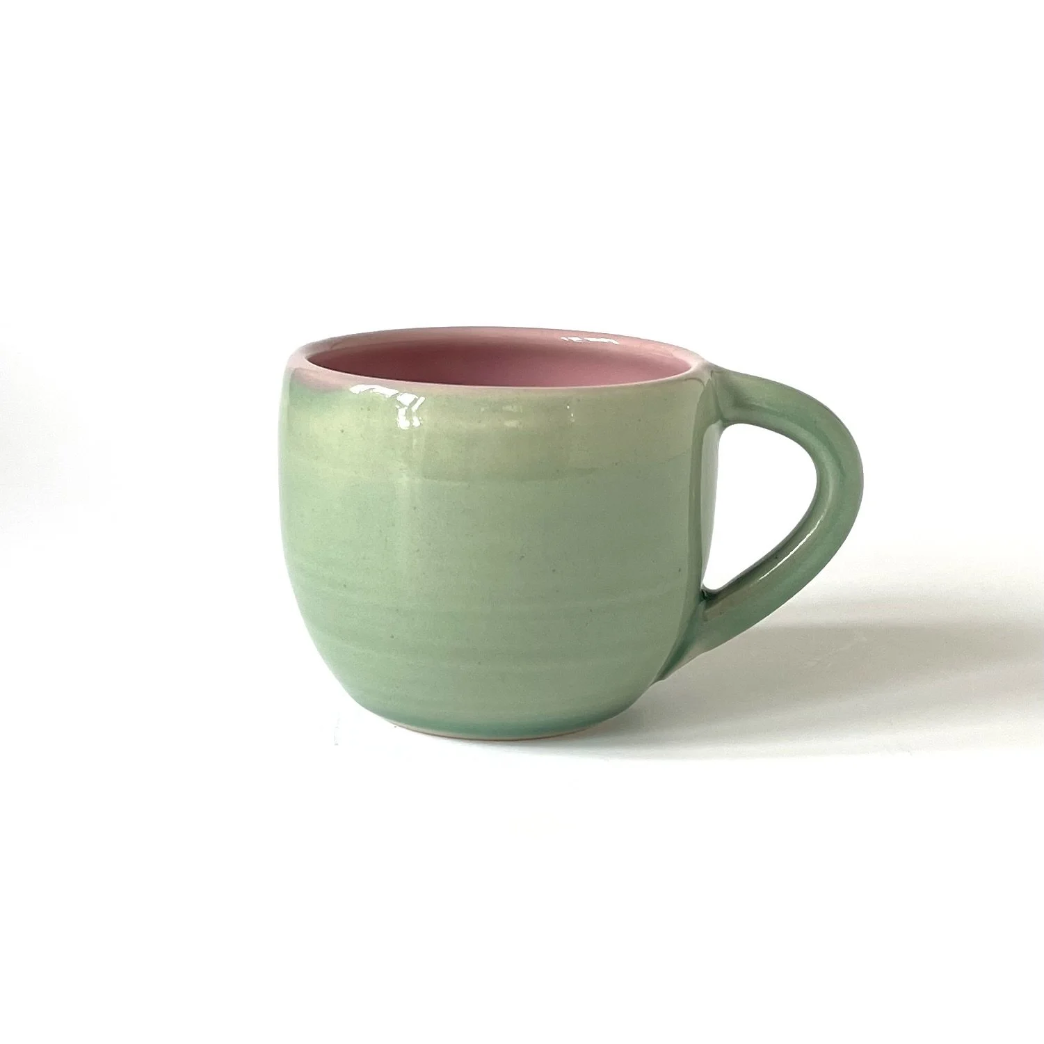 pink and green curved hand thrown stoneware flat white cup 1