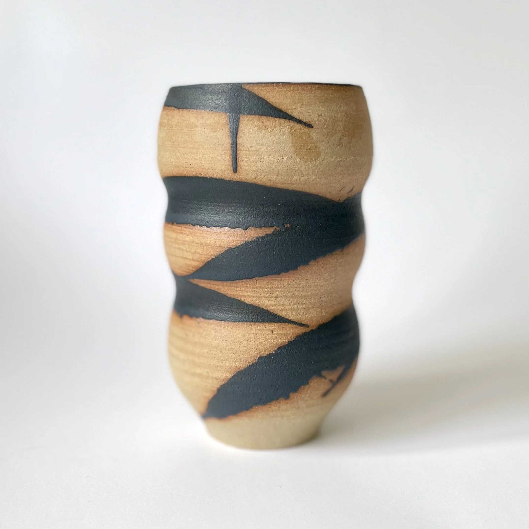Curved stoneware vase in black bamboo design 1