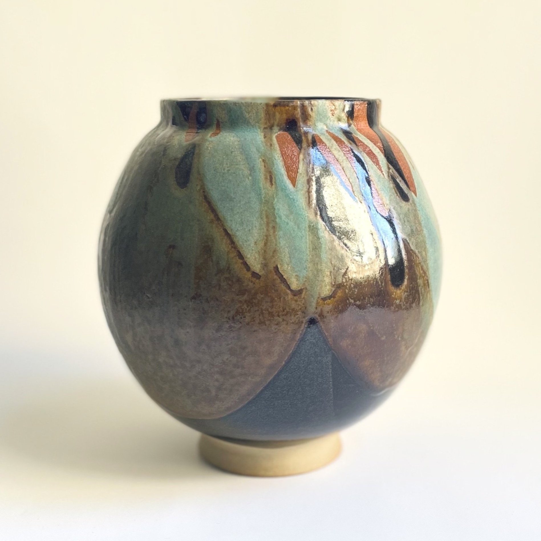 stoneware moon jar in tenmoku and turquoise 3