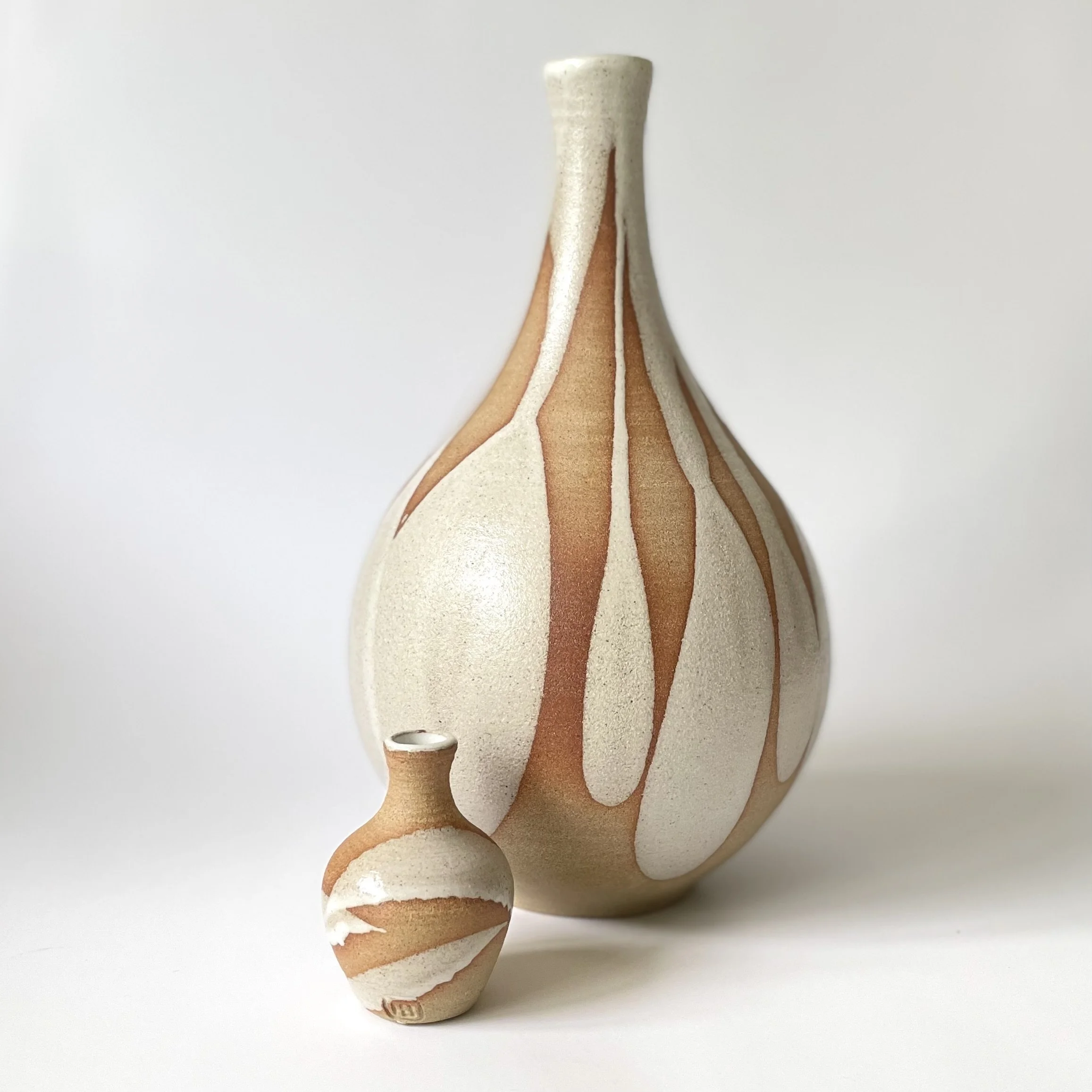 Small stoneware bud vase glazed in white 3