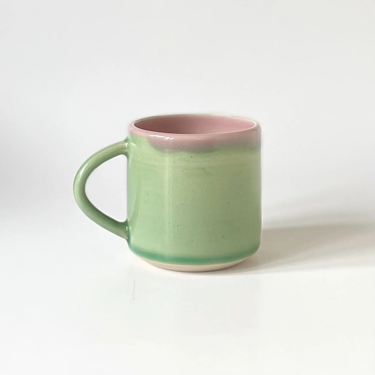 pink and green flat white hand throiwn stoineware cup 1