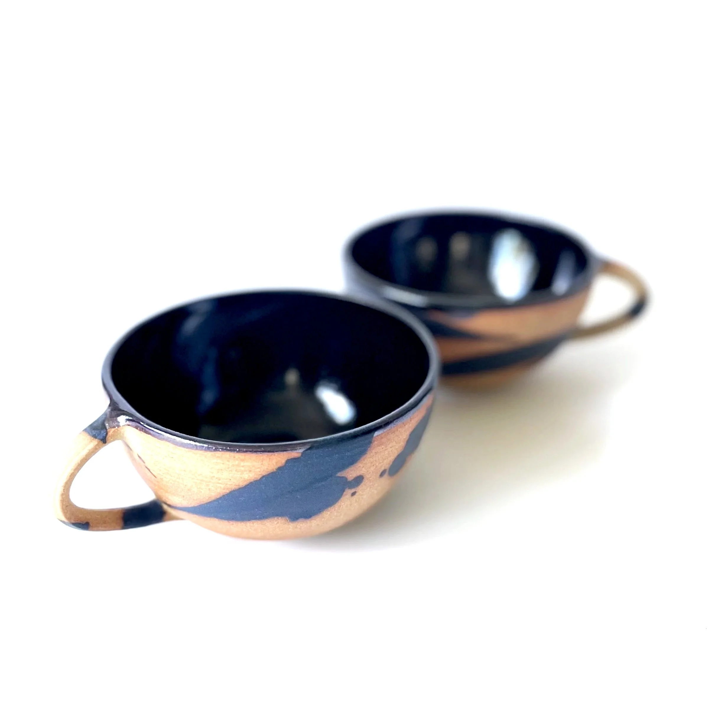 Hand thrown stoneware cups glazed in tenmoku and charcoal mark making 4